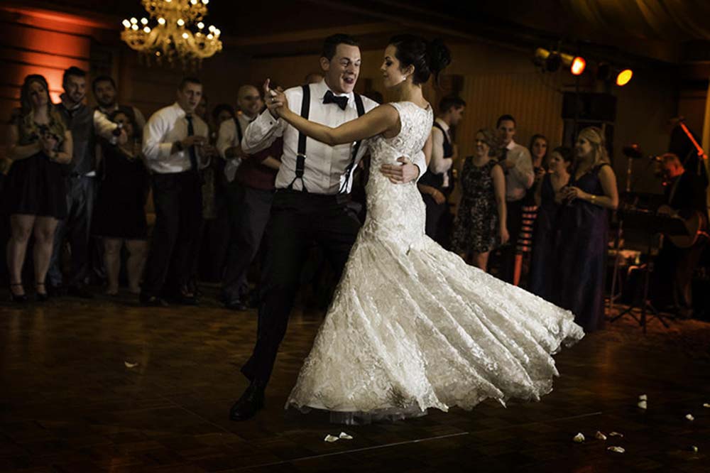 Wedding couple performing a swing dance routine to the music of the Long Island Jazz Orchestra